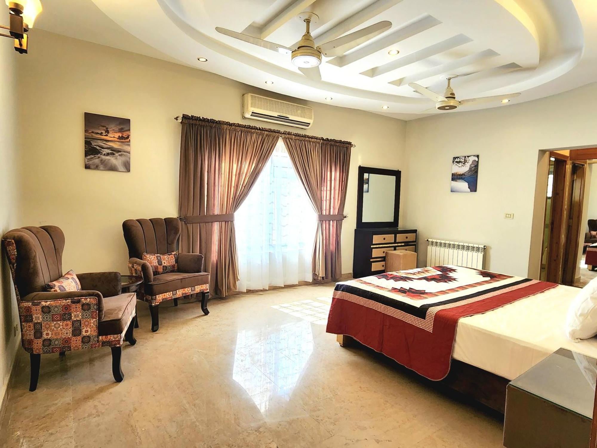 The Millenial Apartments & Suites Bahria Town Ραβαλπίντι Δωμάτιο φωτογραφία