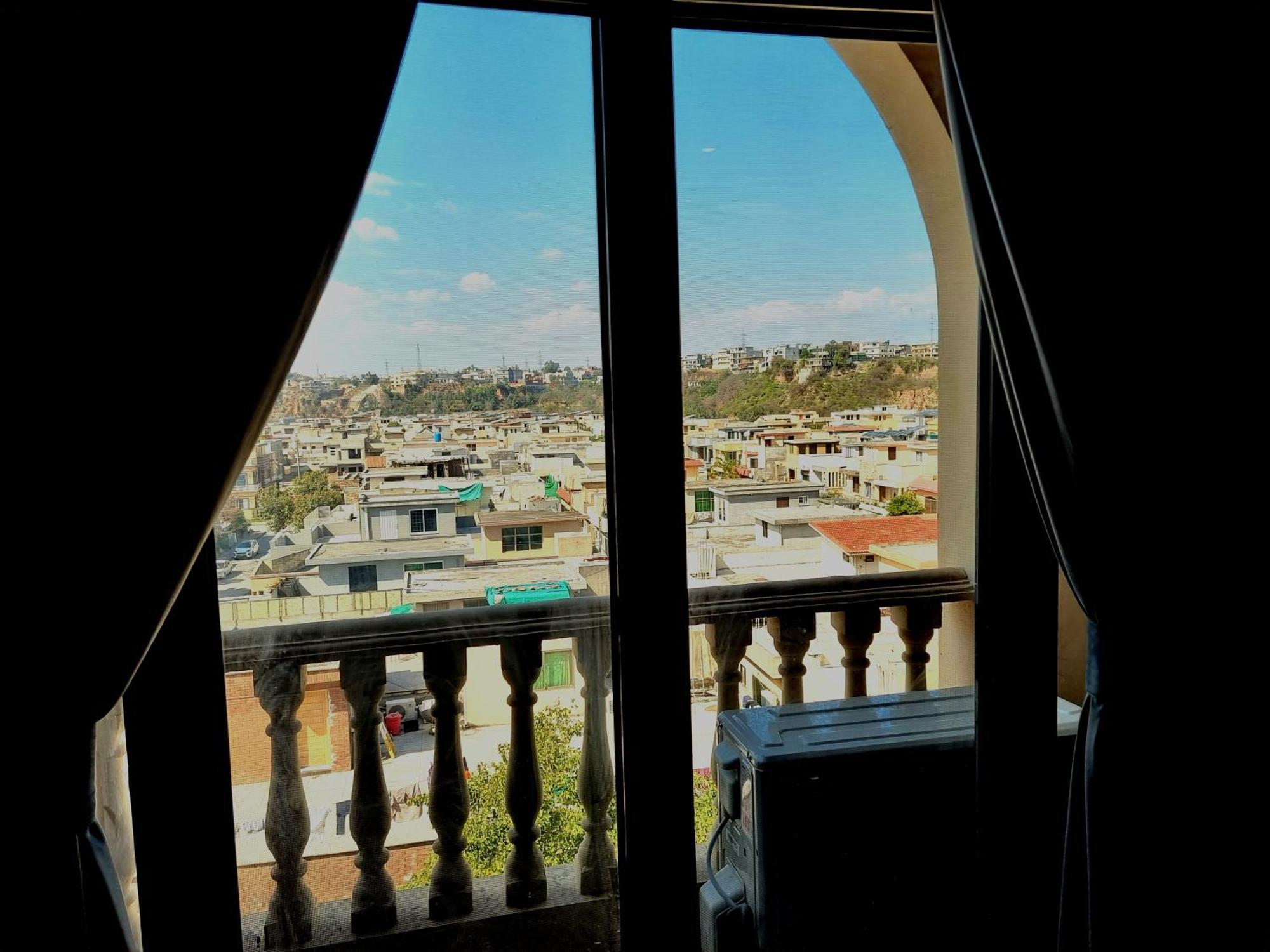 The Millenial Apartments & Suites Bahria Town Ραβαλπίντι Δωμάτιο φωτογραφία