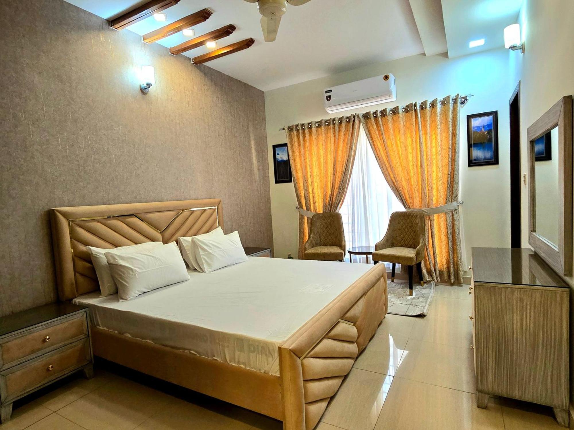 The Millenial Apartments & Suites Bahria Town Ραβαλπίντι Δωμάτιο φωτογραφία