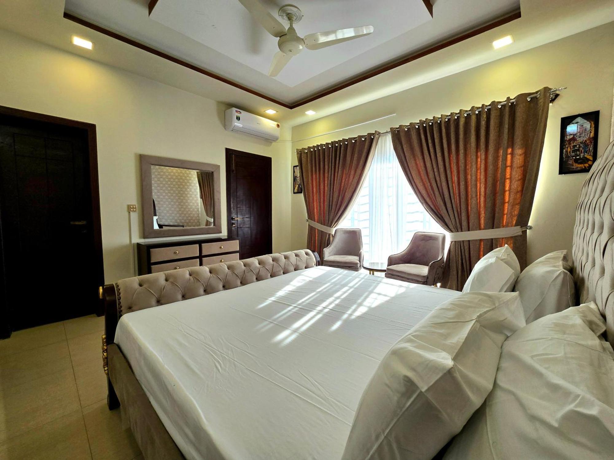 The Millenial Apartments & Suites Bahria Town Ραβαλπίντι Δωμάτιο φωτογραφία