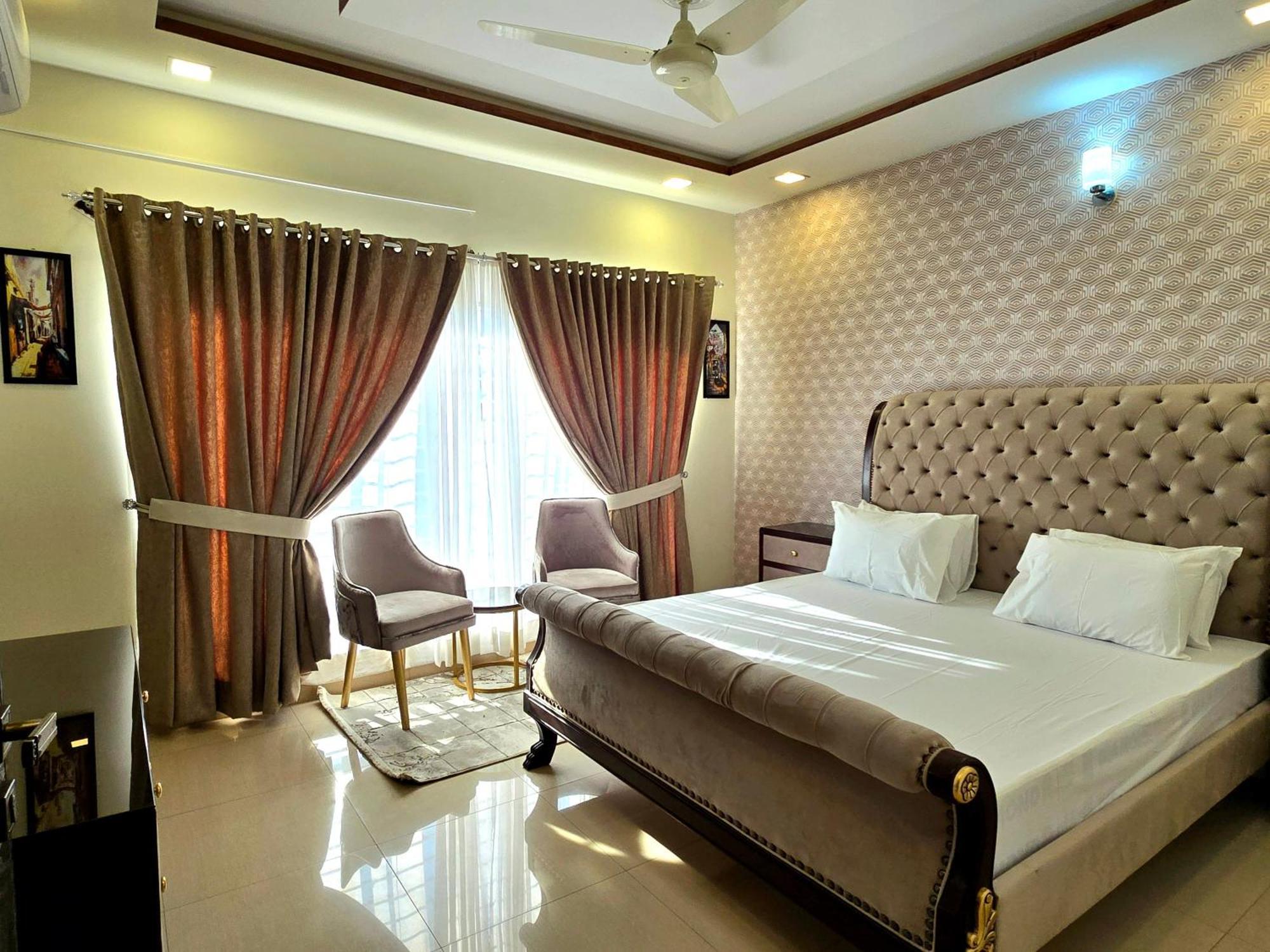 The Millenial Apartments & Suites Bahria Town Ραβαλπίντι Δωμάτιο φωτογραφία