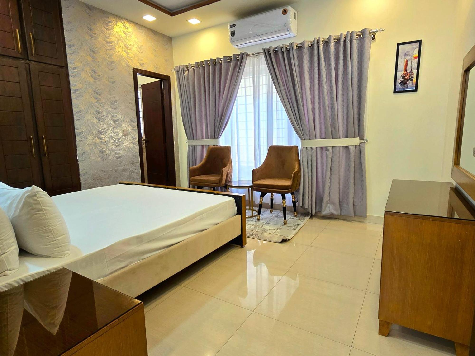 The Millenial Apartments & Suites Bahria Town Ραβαλπίντι Δωμάτιο φωτογραφία